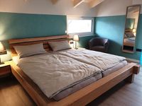 Schlafzimmer mit Doppelbett f&uuml;r sch&ouml;ne Tr&auml;ume